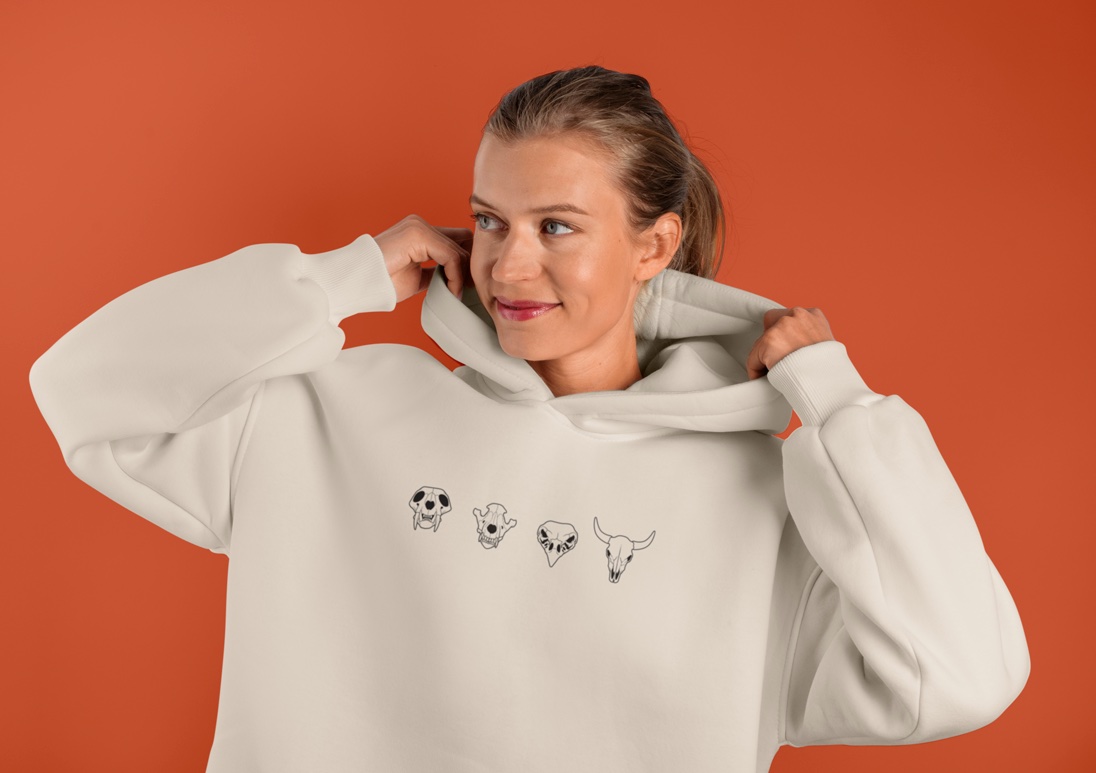 Tribus brand in use — white hoodie with logo on model