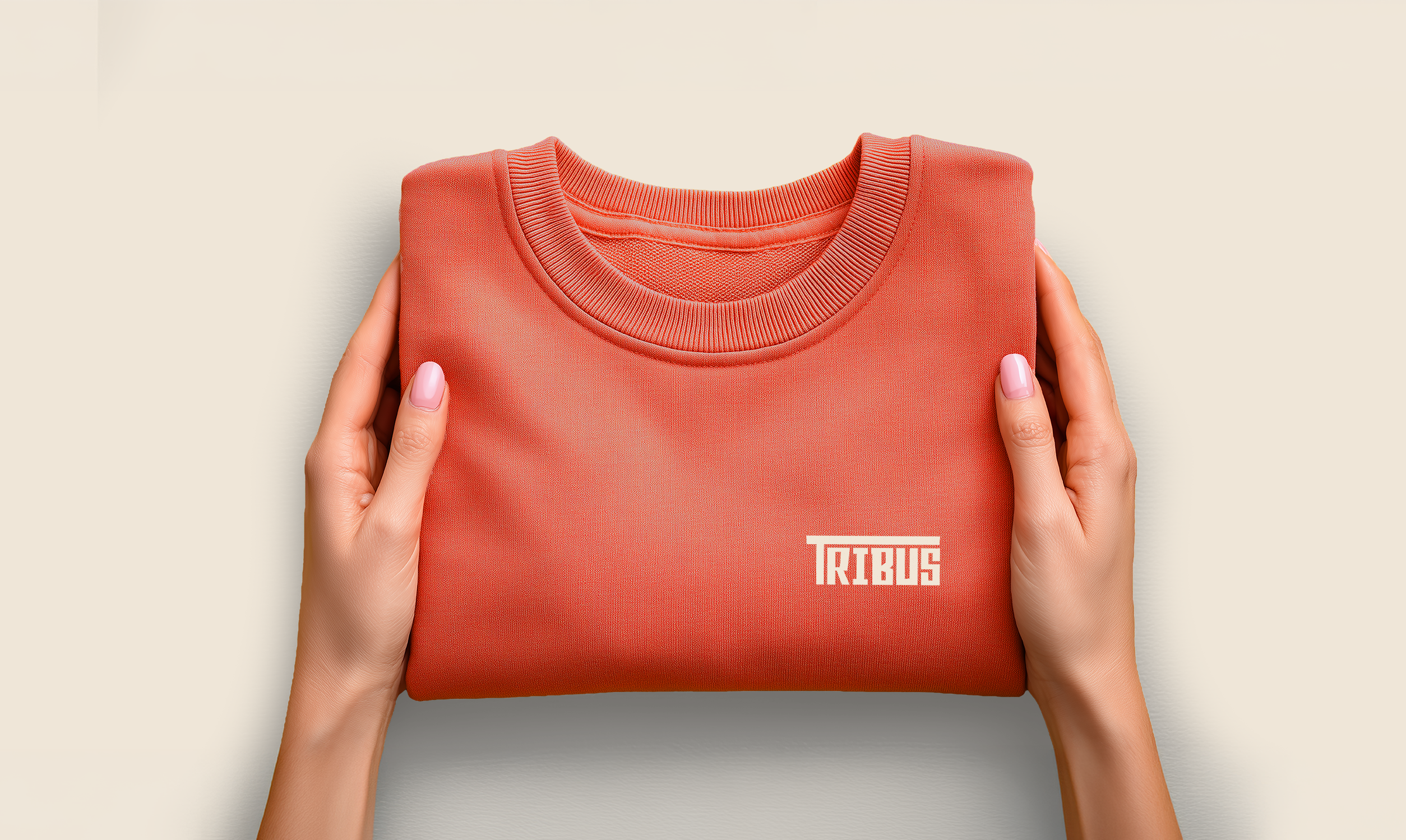 Tribus brand identity — varsity hoodie with logo applied
